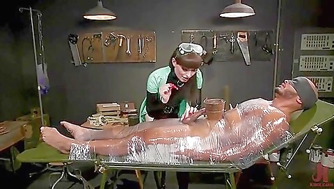 Horny shemale gets fucked by a guy in fetish video