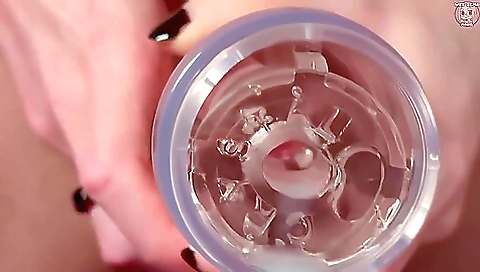 A girl with small tits and an ass fucks in a solo video