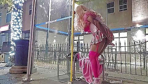 Chubby blonde rides a dildo in bus stop in the park